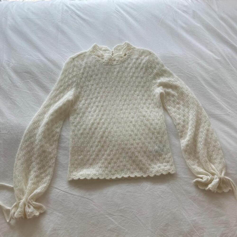 Sezane cream knit sweater with lace trim and tie sleeves
